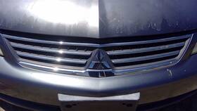 104-50253a Mitsubishi Grille Upper Fits 06-07 Lancer 449348