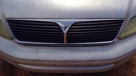 Mr539652 Mitsubishi Grille Excluding Evolution Upper Fits 02-03 Lancer Oem