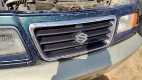 7211177e00d2w Suzuki 1996-1997 Sidekick Front Grille Oem Chrome