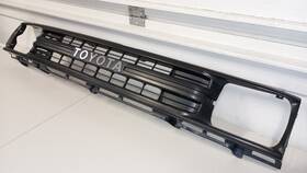 Toyota 53100-89132 1989-1991 Truck Plastic Front Grill With Center Logo Oem