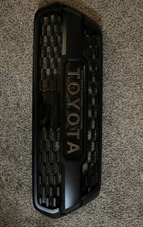 Pt228-35220-aa Toyota Oem Tacoma 18-23 Trail Edition Front Grille Black With Bronze Lettering