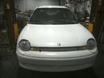 Grille Fits 95-99 Neon 109658. Fixed Price $10.00.