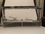 1979-85 Cadillac Eldorado Passenger Headlight Trim Bezel Turn Signal Assembly. Fixed Price $69.95.