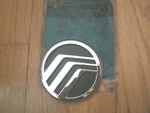 Nos 1984 1985 Mercury Topaz Grill Emblem E46Y-8213-A. Fixed Price $22.49.