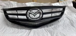 Mazda BN9G-50-710C 18 Grille *carbon Grey* 2004-06 3 Sporty Type Nos. Fixed Price $120.00.