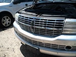 Grille Upper Chrome Fits 07-14 Navigator 104864617. Fixed Price $302.95.