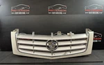 02-06 Escalade Ext Front Upper Chrome Grille White Diamond 98U. Fixed Price $300.00.