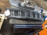 Grille Wk Body Vin Or 6TH Digit Upper Fits 17-22 Grand Cherokee 2441004. Fixed Price $240.00.