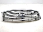 13-14, Infiniti QX80, Upper Grille W/camera, Chrome, 623101ZR1A, Broken Tab, Oem. Fixed Price $392.40.