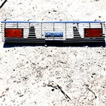 1980 1981 1982 Datsun 210 Sedan Grille W/ Turn Signal Lights. Used Ad# 9507. Fixed Price $189.00.