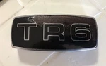 Triumph TR6 Original Metal & Enamel Front Medallion Grill Badge Assembly. Fixed Price $125.00.