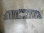 Ford Ampn 3317 Oem Hard Plastic Front Honeycomb Grille / F-18653. Fixed Price $49.99.