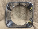 Nos Ford D7OB-13064-AWA 1975-77 Granada Mercury Monarch Headlight Bezel. Fixed Price $25.00.