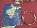 1955 Packard Grille Gold Color Circle 466343 Nos. Fixed Price $225.00.