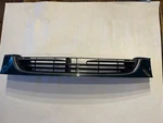 Grille Fits 1996 1997 Mazda 626 Oem Excellent Green Metallic 11Q. Fixed Price $50.00.