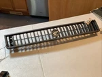 1985-87 Ford Mercury Lynx Grille + Emblem Ornament. Fixed Price $61.75.
