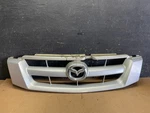 2005 - 2006 Mazda Tribute Front Upper Grille Oem AA2255 Dg. Fixed Price $78.38.