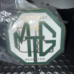 Rare "new Old Stock" Northwest Mg Register Grille Badge. Fixed Price $74.00.