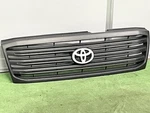 Toyota Land Cruiser 100 Oem Front Grille 53101-60260 Black With White Emblem. Fixed Price $266.58.