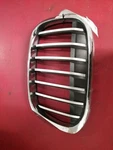 Driver Grille Bumper Mounted Base Upper Fits 16-19 Bmw X1 1046775. Fixed Price $58.50.