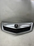 2010 - 2012 Acura Rdx Oem Silver Mesh Front Upper Emblem. Fixed Price $240.00.