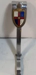 1946-1948 Lincoln V-12 Upper Center Grille Piece & Emblem 7035-5-EH-8241. Fixed Price $125.00.