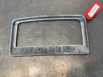1975 Ford 1000 Tractor Upper Grille Headlight Bezel. Fixed Price $70.00.
