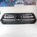 *damaged* 2016-2020 Toyota Tacoma Front Upper Grille Chrome Surround Matte Black. Fixed Price $49.99.