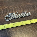 Gm 1974-77 Malibu Front Fender Emblem Nameplate Script 76 1975 1977 Badge. Fixed Price $18.99.
