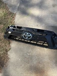 2012-2015 Toyota Tacoma Oem Front Grille Black/gray Trim W/emblem Inner. Fixed Price $145.00.