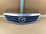 2000-2002 Mazda 626 Front Bumper Grille 5-845-973. Fixed Price $94.49.