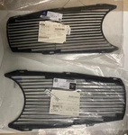 New Genuine Mercedes W113 Radiator Grille Set 1138800485 / 1138800385. Fixed Price $1195.95.