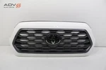 2020 - 2023 Toyota Tacoma Front Bumper Upper Grille Molding Oem. Fixed Price $499.99.