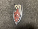 1958 Oldsmobile Grille Emblem Badge Hood Ornament Trim Metal Rare 574767. Fixed Price $49.00.