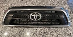 Pre Owned 2012-2015 Oem Toyota Tacoma Front Grille 53100-04470. Fixed Price $199.99.