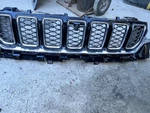 2021 -2024 Front Bumper Upper Grille Oem 68425008AB Jeep Cherokee With Camera. Fixed Price $600.00.