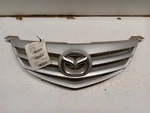 Grille Upper Sedan 3S Body Color Bars Round Fog Lamps Fits 04-06 Mazda 161959. Fixed Price $153.15.