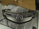 2007-2009 Acura Mdx Front Bumper Upper Grille W/ Emblem 71122-STKA-A000. Fixed Price $99.87.