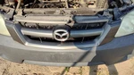 2005-2006 Mazda Tribute Front Grille Oem Gray EF9250711AA. Fixed Price $186.07.