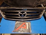 00-01 Mazda Van Grille Black W/chrome Surround Horizontal Billet W/emblem Oem. Fixed Price $79.62.