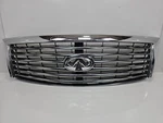 11-13 Infiniti QX56 QX80 Front Upper Bumper Grill W/ Camera 623101LA0A *damaged*. Fixed Price $175.00.