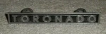 1982 - 1985 Oldsmobile Toronado Radiator Grille Name Plate 22516290. Fixed Price $45.00.