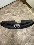 2004-2005 Toyota Sienna Front Upper Grille Emblem Black Oem 53101-AE050. Fixed Price $100.00.
