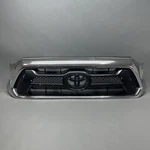 Toyota Tacoma Grille 2012 2013 2014 2015 Oem 53100-04470 Damaged. Fixed Price $134.10.