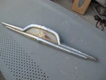 56 Mercury Monterey Trunk Deck Lid Latch Ornament Emblem. Fixed Price $150.00.