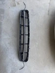 2016 - 2019 Chevrolet Corvette Carbon Flash Front Lower Grille W/cameras Oem New. Fixed Price $500.00.