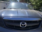 Grille Fits 01-04 Mazda Tribute 70612 Front Upper. Fixed Price $89.99.