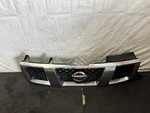 2004-2007 Nissan Titan Se A60 Front Upper Grille 62310 7S000 Silver Oem. Fixed Price $179.00.