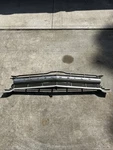 1965 Oldsmobile Ground Grill 589789 Cutlass, 442, F85, Vista Cruiser Used Good. Fixed Price $135.00.