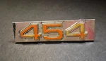 Genuine Vintage 1970-1972 Legendary 454 Cubic Inch V8 Chevy Engine Emblem. Fixed Price $25.00.